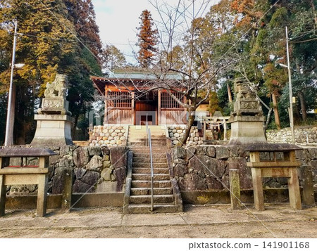 The grounds of a traditional Japanese shrine, enveloped in silence The grounds of a traditional Japanese shrine, enveloped in silence 141901168