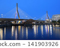 The Zakim Bridge illuminated at night with nice reflections in Boston, USA 141903926