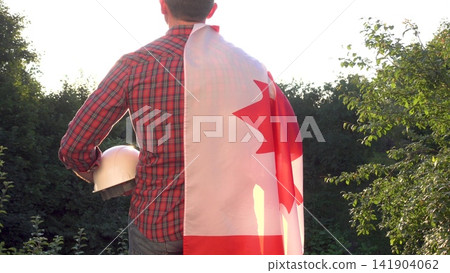 Construction worker and Canadian flag Construction worker and Canadian flag 141904062