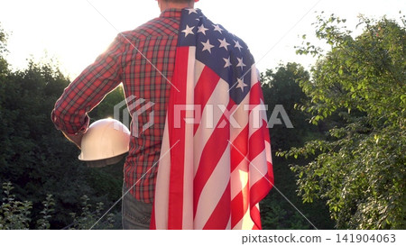 Construction worker and American flag Construction worker and American flag 141904063