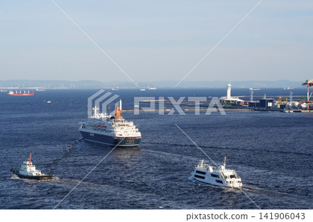 The cruise ship Nippon Maru sailing in Yokohama Port, with the Symbol Tower and the Boso Peninsula visible in the background. The cruise ship Nippon Maru sailing in Yokohama Port, with the Symbol Tower and the Boso Peninsula visible in the background. 141906043