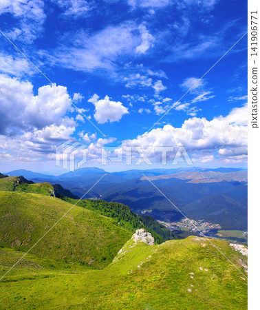 Aerial view of picturesque scenery in Carpathian mountains, Romania. A bird's-eye view of the enchanting mountain landscape. Beautiful landscape of Carpathian mountains, Europe Aerial view of picturesque scenery in Carpathian mountains, Romania. A bird's-eye view of the enchanting mountain landscape. Beautiful landscape of Carpathian mountains, Europe 141906771