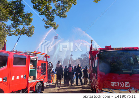 Water discharge demonstration at the New Year's fire brigade ceremony Water discharge demonstration at the New Year's fire brigade ceremony 141907511