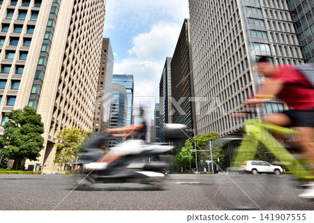 Bicycles riding through Otemon intersection Bicycles riding through Otemon intersection 141907555