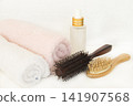 serum, brush comb health care for hairs and terry cloth of lifestyle woman 141907568