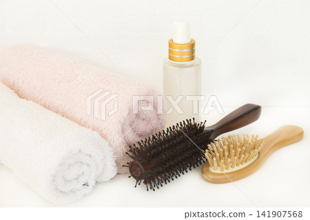 serum, brush comb health care for hairs and terry cloth of lifestyle woman serum, brush comb health care for hairs and terry cloth of lifestyle woman 141907568