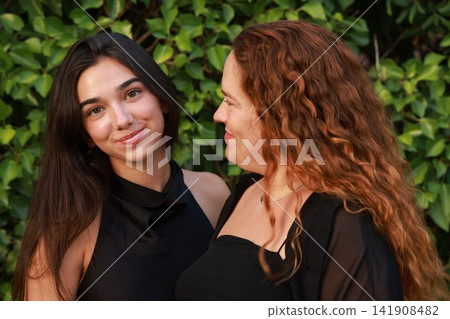 Pregnant Woman Enjoying a Peaceful Outdoor Moment Pregnant Woman Enjoying a Peaceful Outdoor Moment 141908482