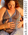 Pregnant Woman Enjoying a Peaceful Outdoor Moment 141908507