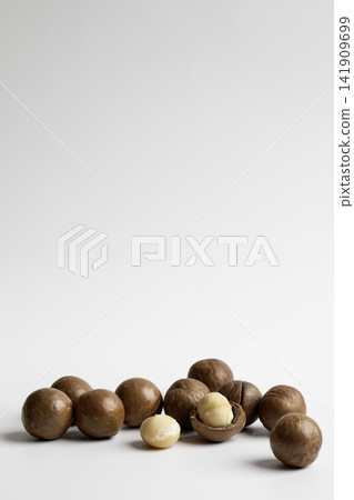 Macadamia nuts isolated on white background Macadamia nuts isolated on white background 141909699