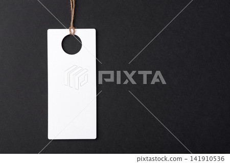 Empty white tag on black background 141910536