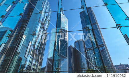 Hong Kong Aug 7 2026 skyscrapers framed through glass facade in Central Hong Kong Aug 7 2026 skyscrapers framed through glass facade in Central 141910982