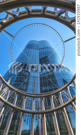 Hong Kong Aug 7 2026 Henderson skyscraper framed through a circular metallic 141910987