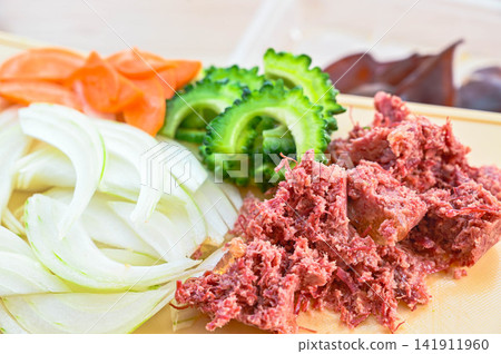 Ingredients for corned beef and bitter melon stir-fry Ingredients for corned beef and bitter melon stir-fry 141911960
