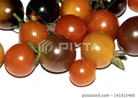 Homegrown fresh tomatoes different breeds and colours on a white background vine picked Homegrown fresh tomatoes different breeds and colours on a white background vine picked 141913460