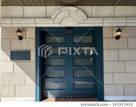 A Western-style building with a dark green door that welcomes you. A Western-style building with a dark green door that welcomes you. 141913920
