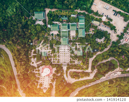 religious Lady Buddha monument at Linh Ung pagoda and buddhism temple in Danang, Asian religion and spirituality, Son Tra peninsula, Da Nang Vietnam, aerial drone view, directly above 141914128