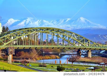 Asahikawa's symbol, Asahibashi Bridge, and Mount Daisetsuzan Asahikawa's symbol, Asahibashi Bridge, and Mount Daisetsuzan 141914474