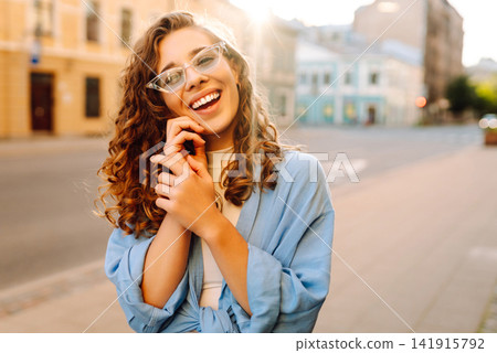 Young woman travels during student vacation holidays in street of European city. Fashion, lifestyle Young woman travels during student vacation holidays in street of European city. Fashion, lifestyle 141915792