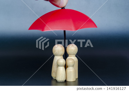 Minimalist family figures sheltered under a red umbrella representing safety, leadership and financial security Minimalist family figures sheltered under a red umbrella representing safety, leadership and financial security 141916127