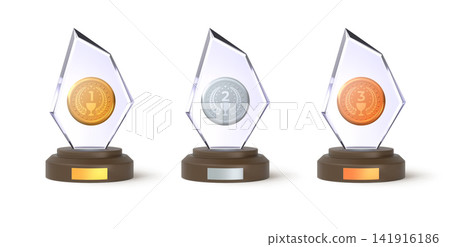 A set of three glass trophies with gold, silver, bronze medals on round bases with blank plaques. A set of three glass trophies with gold, silver, bronze medals on round bases with blank plaques. 141916186