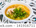 Chinese noodles served at food booths in outdoor event venues 141916711