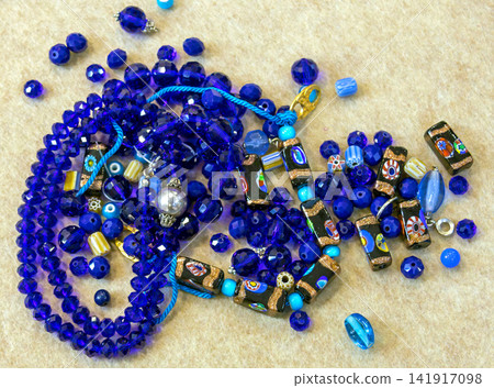 Blue shiny beads pile Blue shiny beads pile 141917098