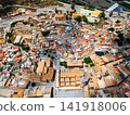 Aerial view of Lorca town with historic buildings and roads in Spain 141918006