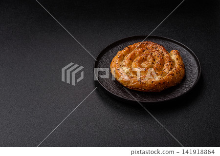 Greek cheese and sesame pie, a traditional Balkan dish. Balkan pie Greek cheese and sesame pie, a traditional Balkan dish. Balkan pie 141918864