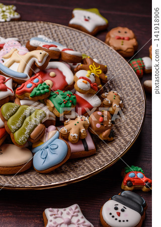 Gingerbread as a Christmas staple, sweets for the holiday interior. Gingerbread as a background Gingerbread as a Christmas staple, sweets for the holiday interior. Gingerbread as a background 141918906