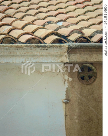Traditional terracotta roof tiles showing architectural details Traditional terracotta roof tiles showing architectural details 141919600
