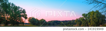 Magical pink purple sunrise over the lake. Misty morning, rural landscape, wilderness, mystical feeling Magical pink purple sunrise over the lake. Misty morning, rural landscape, wilderness, mystical feeling 141919949