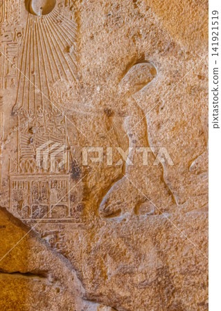 Ancient egyptian paintings and hieroglyphs carved on the stone wall Ancient egyptian paintings and hieroglyphs carved on the stone wall 141921519