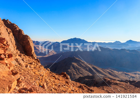 View of the rocky Sinai mountains and desert in Egypt View of the rocky Sinai mountains and desert in Egypt 141921584