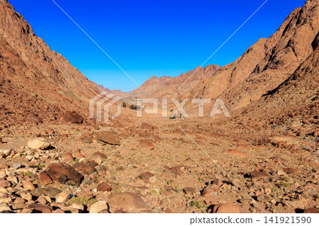 View of Saint Catherine's monastery (or Sacred Monastery of the God-Trodden Mount Sinai) in Sinai Peninsula, Egypt View of Saint Catherine's monastery (or Sacred Monastery of the God-Trodden Mount Sinai) in Sinai Peninsula, Egypt 141921590