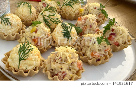 small basket servings of dill and grated cheese salad rustic food presentation small basket servings of dill and grated cheese salad rustic food presentation 141921617