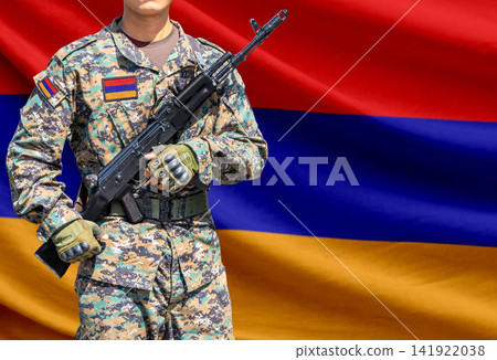 Armenia flag with soldier holding assault rifle Armenia flag with soldier holding assault rifle 141922038