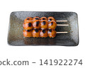 Delicious-looking dumplings served on a Japanese-style plate 141922274