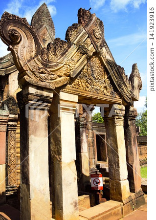 Pedestal carvings of Vishnu remaining on the second wall of Banteay Srei Temple Pedestal carvings of Vishnu remaining on the second wall of Banteay Srei Temple 141923916