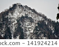 Snow-covered mountains 141924214