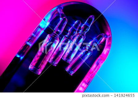 Weight loss innovation using medical ampoules under neon light Weight loss innovation using medical ampoules under neon light 141924655