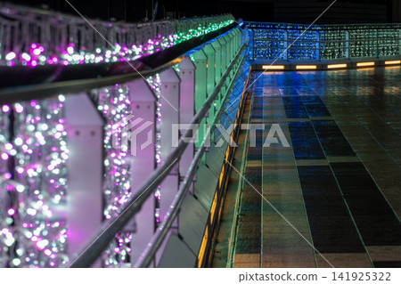 Colorful LED lights illuminate the city at night. Colorful LED lights illuminate the city at night. 141925322
