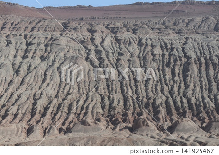 The Flaming Mountains, one of the famous landmarks in the Turpan Basin along China's Silk Road. The Flaming Mountains, one of the famous landmarks in the Turpan Basin along China's Silk Road. 141925467