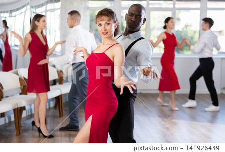 Adult man and adult woman dance twist Adult man and adult woman dance twist 141926439