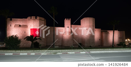 Ribat fortress Monastir in Tunisia ancient city and popular tourist destination on Mediterranean Sea. Color illumination in Ribat fortress Monastir in Tunisia ancient city and popular tourist destination on Mediterranean Sea. Color illumination in 141926484