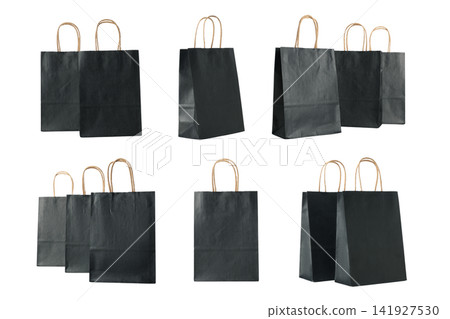 Black Friday. Variety of black shopping bags positioned creatively in dynamic arrangement, PNG Black Friday. Variety of black shopping bags positioned creatively in dynamic arrangement, PNG 141927530