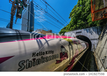 The Hello Kitty Shinkansen emerges from the Kobe Tunnel and arrives at Shin-Kobe Station. The Hello Kitty Shinkansen emerges from the Kobe Tunnel and arrives at Shin-Kobe Station. 141927598