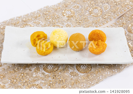 Indian sweets, Laddu (cross-section) Indian sweets, Laddu (cross-section) 141928095
