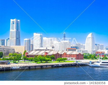 Summer in Yokohama Bay Area: Red Brick Warehouse and the skyscrapers of Minato Mirai Summer in Yokohama Bay Area: Red Brick Warehouse and the skyscrapers of Minato Mirai 141928358