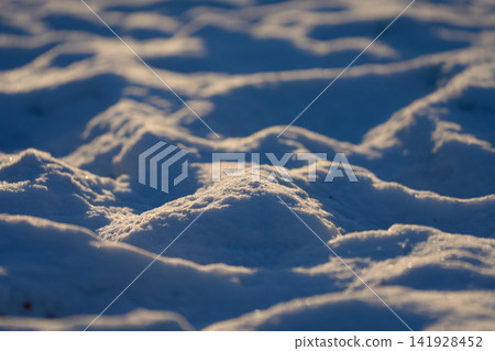 The snow-covered undulations of Irkutsk sparkle in the winter light. The snow-covered undulations of Irkutsk sparkle in the winter light. 141928452