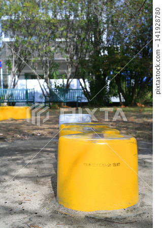 Yellow bench in the park Yellow bench in the park 141928780